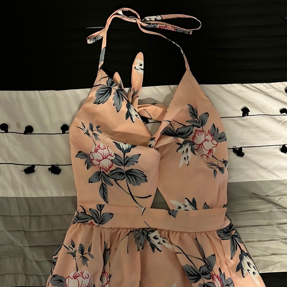 Brand new. Never worn or washed but no tags as it came shipped in a bag.